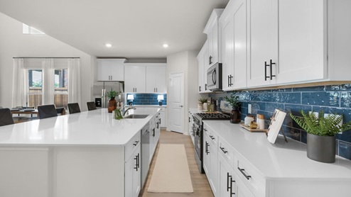 Interior kitchen with center island open to living area