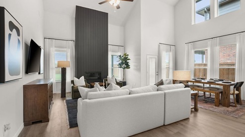 Interior living area with large windows and fire place