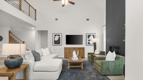 Interior living area with large windows and fire place