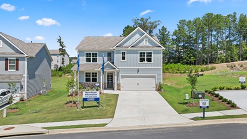 Exterior two-story home with stone detailing and cladding