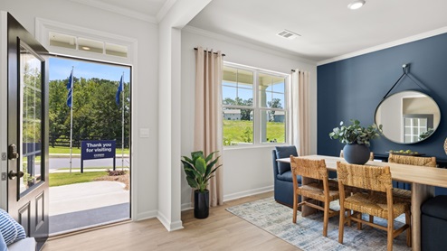 Interior entry-way next to flex room with accent wall