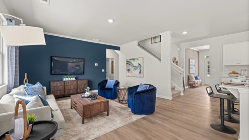 Interior living area with windows and accent wall