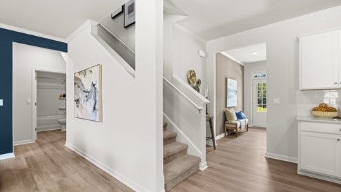 Interior hallway open to staircase