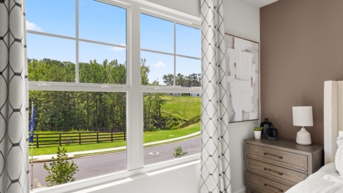 Interior bedroom with large window