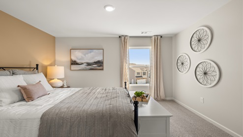 Loft + Secondary Bedroom New Construction Home features versatile loft space outside two secondary bedrooms, maximizing usability and privacy