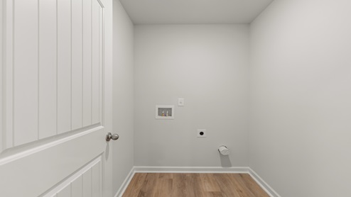 Laundry room with washer and dryer connections.
