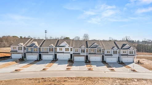 Two story townhome elevations. New Home For Sale in Rolling Meadows Dallas Georgia featuring townhomes