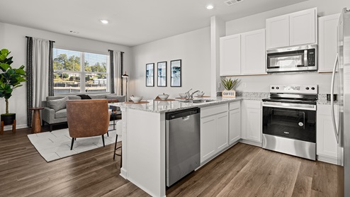 pearson model townhome kitchen with stainless-steel appliances