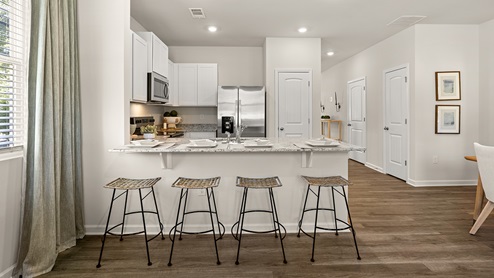 pearson kitchen with granite countertops and stainless steel appliances