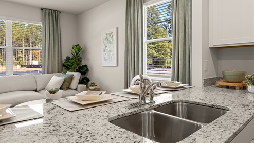 pearson updated kitchen with white cabinets and granite countertops