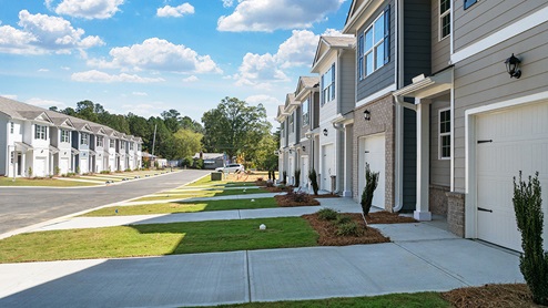 pearson townhome with long driveways and landscaping in old summerville village