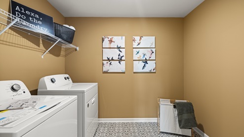 laundry room with side by side washer and dryer