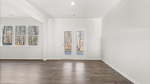 Interior dining area next to back patio doors