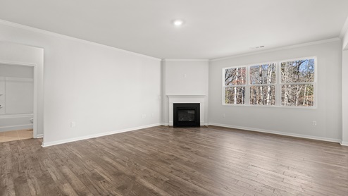 Interior living area with fire place and large windows