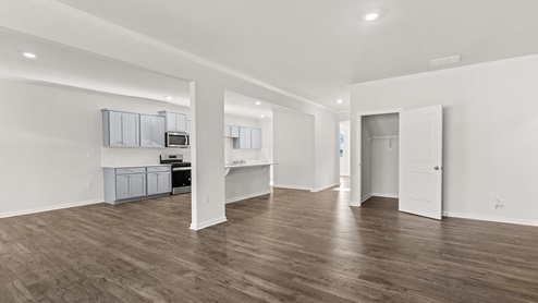 Interior living area open to kitchen with center island