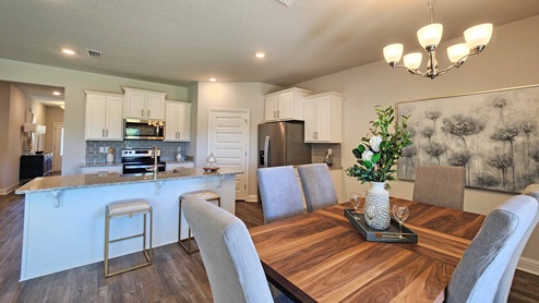 The dining area of the Rhett floor plan model home.