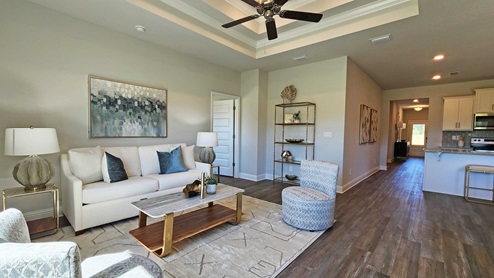 The living area of the Rhett floor plan model home.
