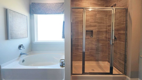 The primary bathroom of the Rhett floor plan model home.