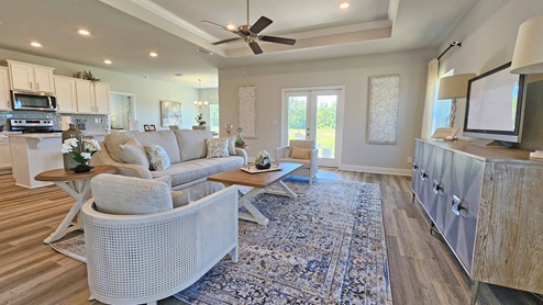 The living area of the Camden floor plan model home.