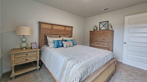 The Riverside guest bedroom in Heritage Lake.
