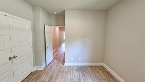 Guest bedroom in a new construction home.