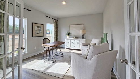 Flex space furnished as study in a new D.R. Horton home.