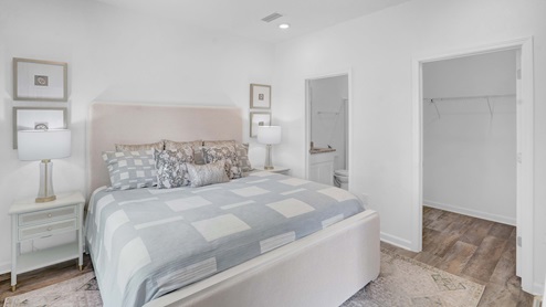 Large primary suite overlooking the backyard.