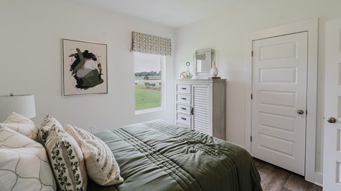 Secondary bedroom with one window.