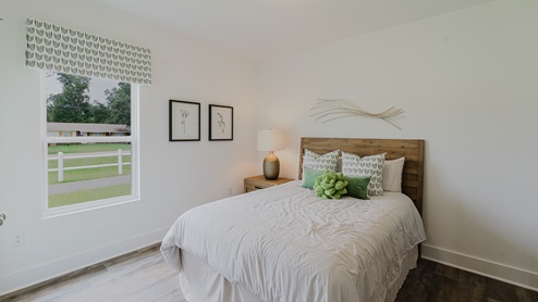 Secondary bedroom with one window.