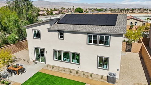 Two-story home with solar panels
