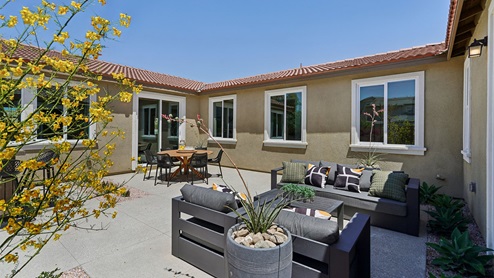 Spacious backyard with patio area