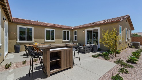 Spacious backyard with patio area