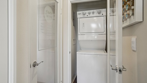 Multi-gen laundry area with stackable washer and dryer