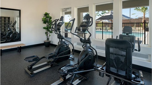 Fitness center with elliptical, weights, bike