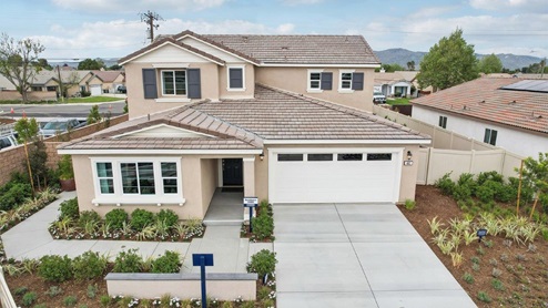 Exterior of a 2-story home with a covered entry