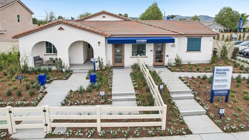 Exterior of a single-story home with a 3-car garage