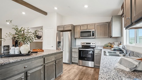 Kitchen with granite countertops and an island