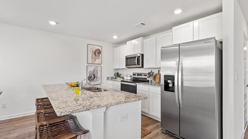 The Aldridge, a roomy residence, presents 3 bedrooms and 2 bathrooms within a single level encompassing 1,272 square feet. It also boasts a two-car garage. The chef inspired kitchen showcases a large breakfast island, elegant granite countertops, modern stainless-steel appliances, and a convenient pantry. This culinary haven seamlessly flows into a relaxed dining area and a spacious living room. The expansive Primary Bedroom indulges residents with a lavish bathroom featuring a walk-in shower, double vanities, and an oversized walk-in closet. The two additional bedrooms offer ample closet space, while a laundry room and linen closet provide practicality and convenience to complete the plan. We take pride in using quality materials and ensuring superior workmanship throughout every aspect of your new home. You'll also benefit from our one-year builder’s warranty, giving you peace of mind and assurance. And that's not all - your new home comes with our fantastic smart home technology package! Our easy-to-use Smart Home Technology Package is included in every home, offering you the ultimate convenience by allowing you to control key features with a simple touch. You can enjoy the convenience of lighting automation, an IQ panel, a video doorbell, keyless front door entry, and temperature control all from the ease of your phone. You can schedule your tour of the Aldridge plan today!