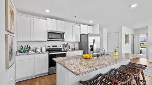 The Aldridge, a roomy residence, presents 3 bedrooms and 2 bathrooms within a single level encompassing 1,272 square feet. It also boasts a two-car garage. The chef inspired kitchen showcases a large breakfast island, elegant granite countertops, modern stainless-steel appliances, and a convenient pantry. This culinary haven seamlessly flows into a relaxed dining area and a spacious living room. The expansive Primary Bedroom indulges residents with a lavish bathroom featuring a walk-in shower, double vanities, and an oversized walk-in closet. The two additional bedrooms offer ample closet space, while a laundry room and linen closet provide practicality and convenience to complete the plan. We take pride in using quality materials and ensuring superior workmanship throughout every aspect of your new home. You'll also benefit from our one-year builder’s warranty, giving you peace of mind and assurance. And that's not all - your new home comes with our fantastic smart home technology package! Our easy-to-use Smart Home Technology Package is included in every home, offering you the ultimate convenience by allowing you to control key features with a simple touch. You can enjoy the convenience of lighting automation, an IQ panel, a video doorbell, keyless front door entry, and temperature control all from the ease of your phone. You can schedule your tour of the Aldridge plan today!