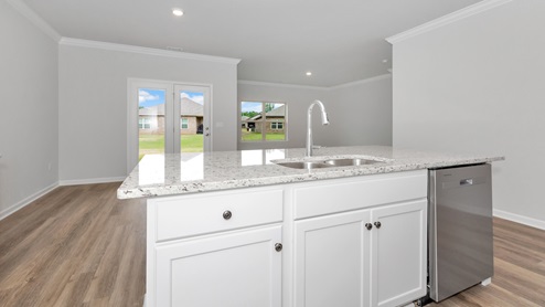 Kitchen island with view of dining / living room area