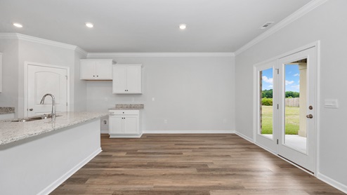 Kitchen island with view of dining / living room area