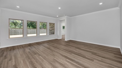 Dining room area with LVP flooring and windows