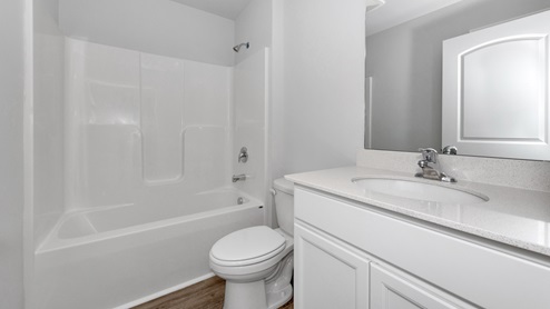 Laundry room with wire shelf and washer dryer hook up