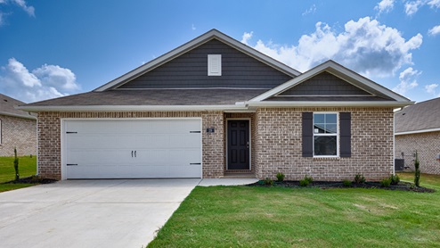 Single story home with brick and two car garage