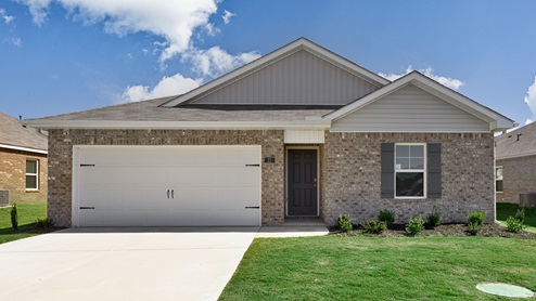 Single story home with brick and two car garage