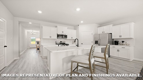white quartz kitchen island with stainless steel appliances