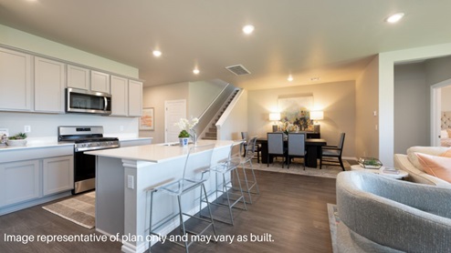 large kitchen with painted cabinets