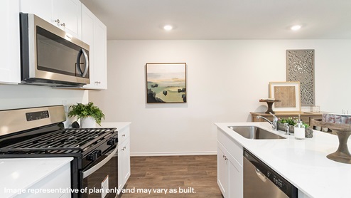 kitchen with stove and microwave