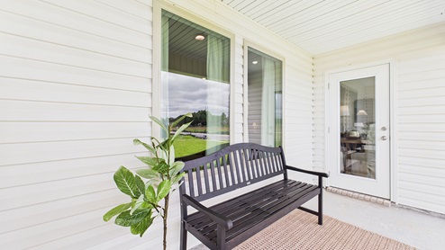 Covered patio with fully sodded yard