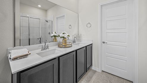1675 Zephyr floorplan Bathroom Gallery Image-The Vlgs of Hurricane Creek in Anna, TX